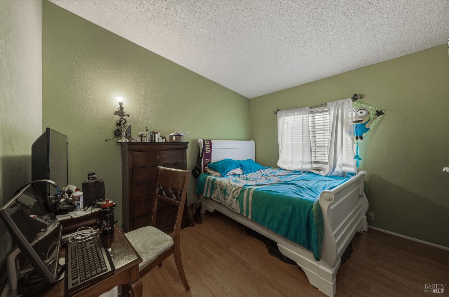 436 McCoy Avenue Santa Rosa, CA 95407 - Photo 20 of 27 a bedroom with a bed and a desk