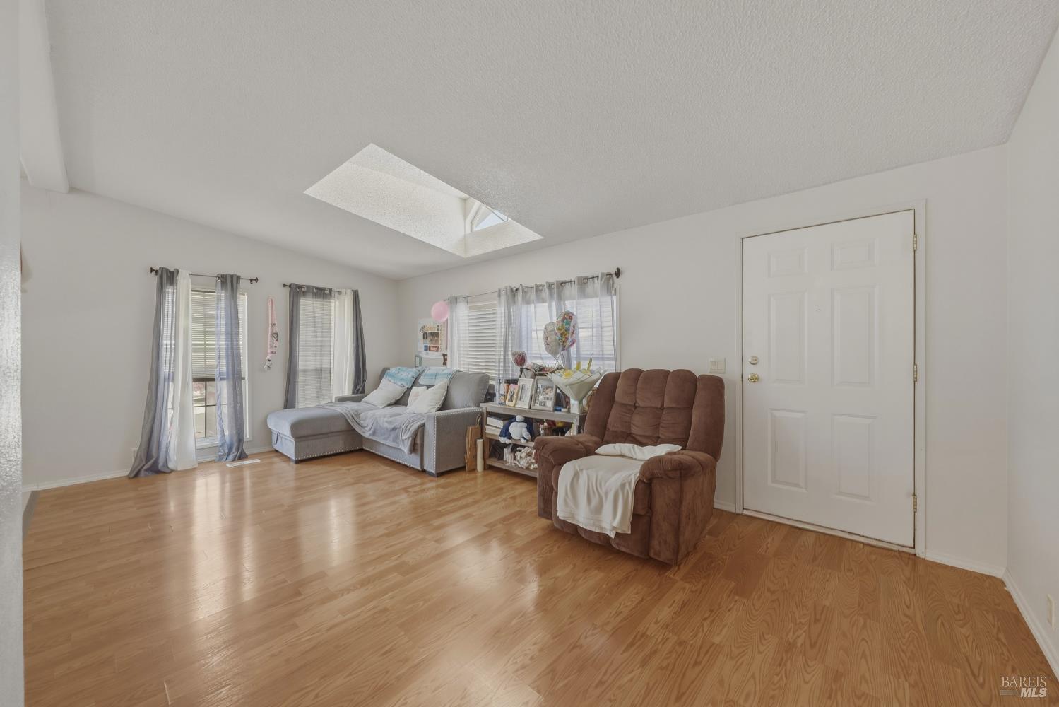 436 McCoy Avenue Santa Rosa, CA 95407 - Photo 5 of 27 a living room with furniture and wooden floor