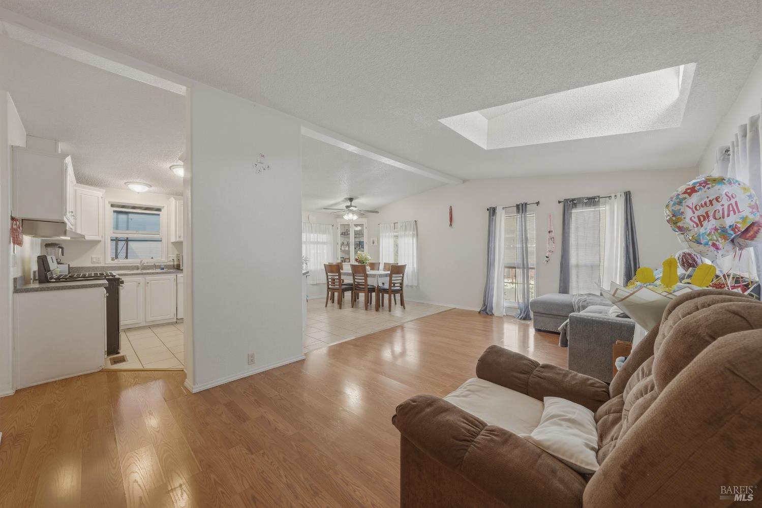 436 McCoy Avenue Santa Rosa, CA 95407 - Photo 6 of 27 a living room with furniture and a wooden floor