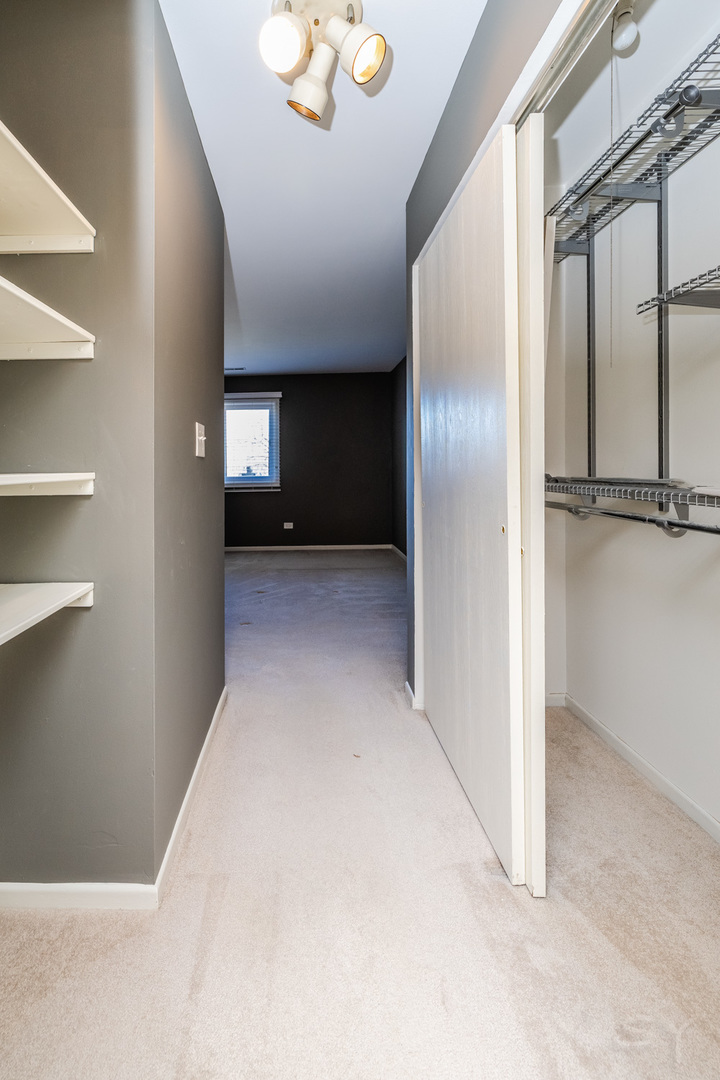 1440 Stonebridge Circle, Unit J7 Wheaton, IL 60189 - Photo 14 of 28 a view of empty room
