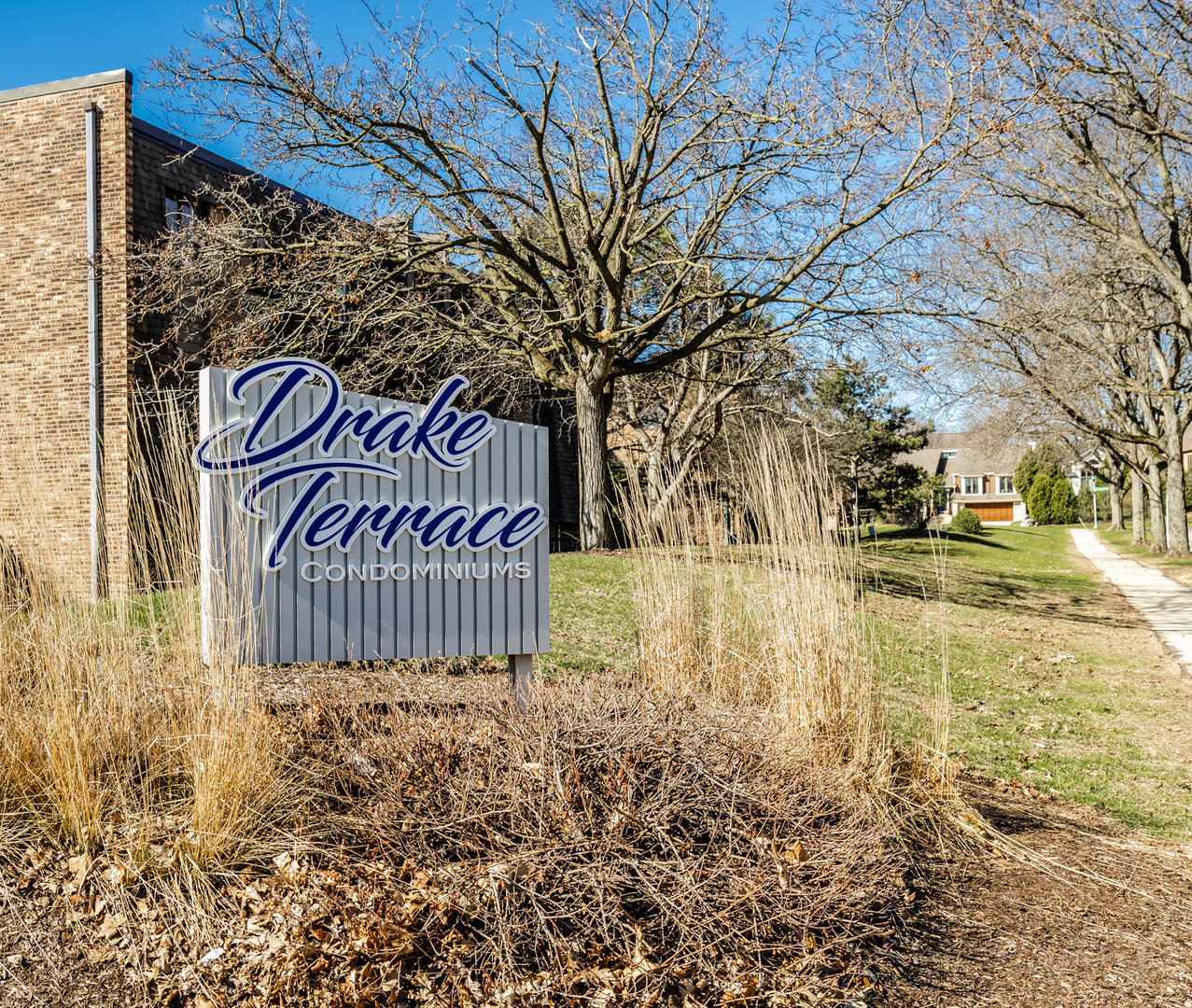1440 Stonebridge Circle, Unit J7 Wheaton, IL 60189 - Photo 25 of 28 a view of street with sign board