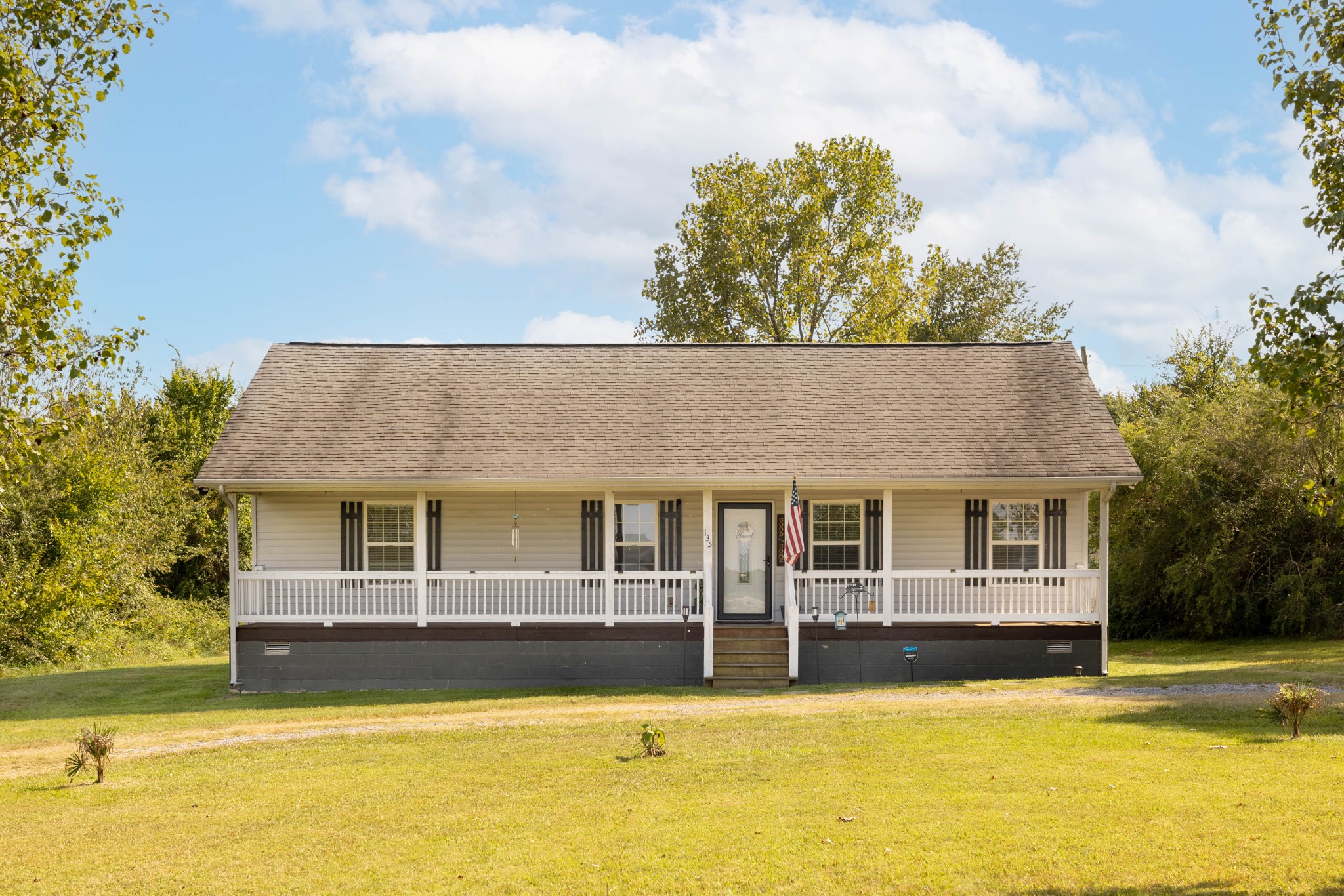135 Corinth Road Portland, TN 37148 - Photo 1 of 44 a front view of a house with swimming pool
