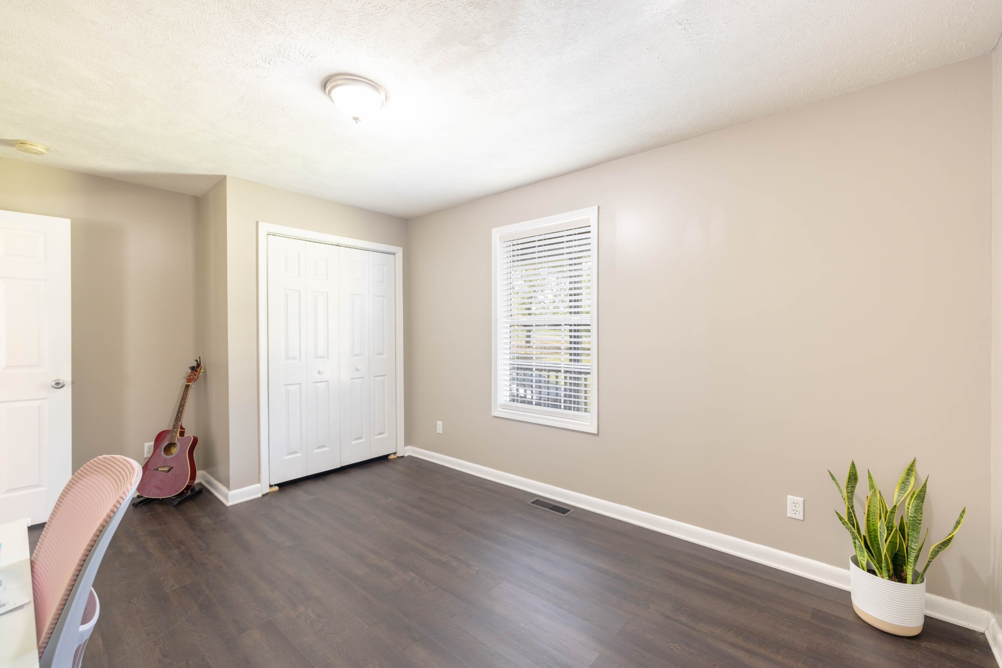 135 Corinth Road Portland, TN 37148 - Photo 23 of 44 a view of livingroom with hardwood floor and window