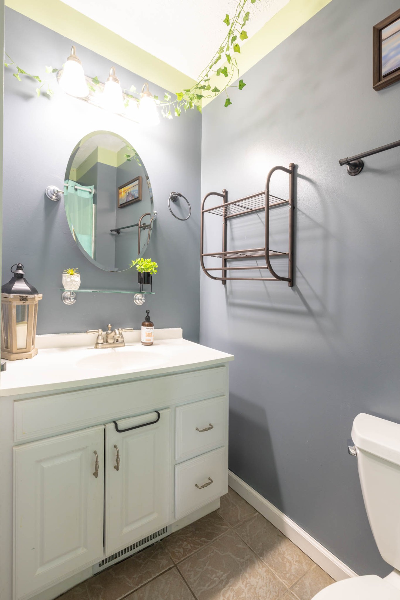 135 Corinth Road Portland, TN 37148 - Photo 24 of 44 a bathroom with a sink mirror and vanity