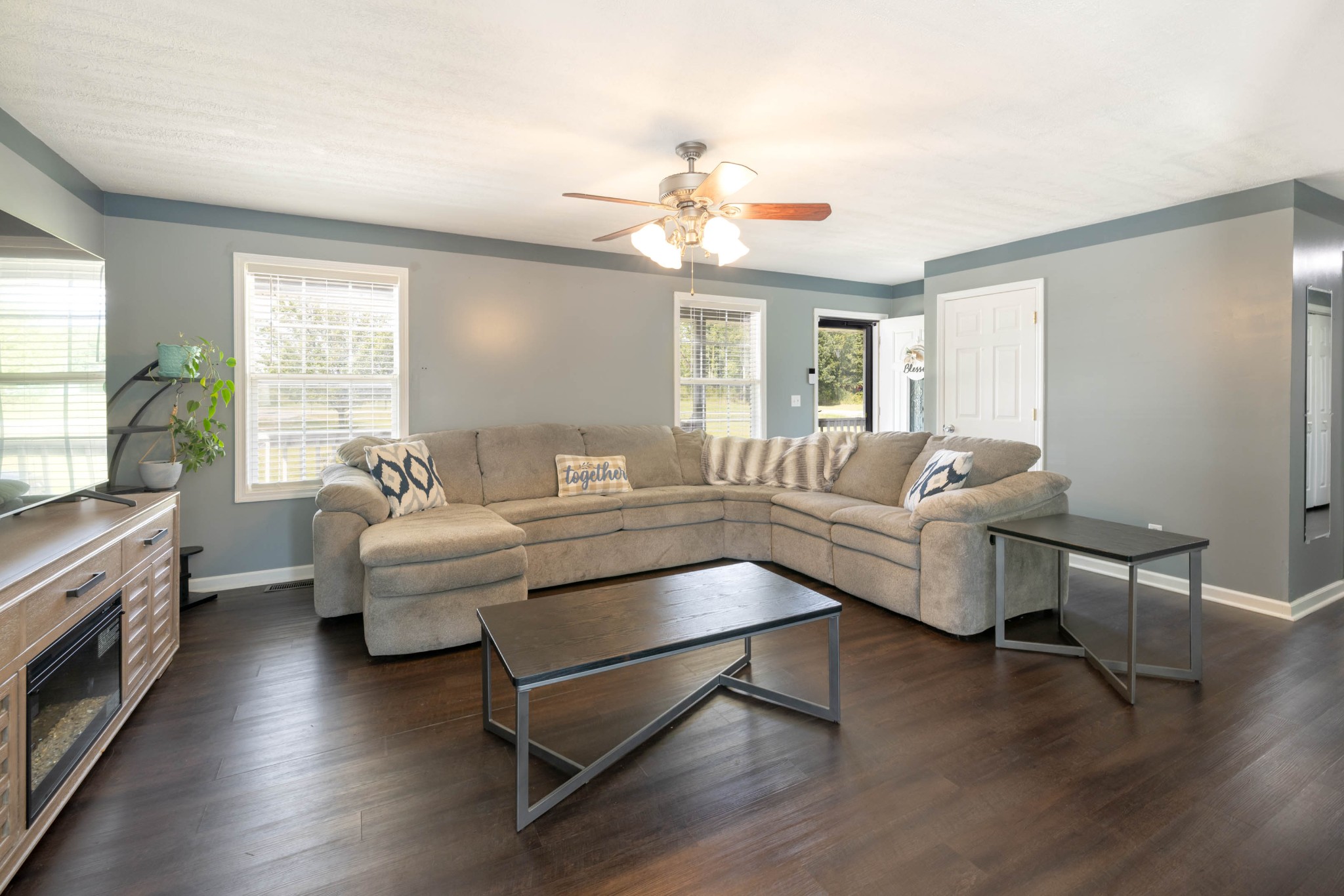 135 Corinth Road Portland, TN 37148 - Photo 3 of 44 a living room with furniture and a fireplace