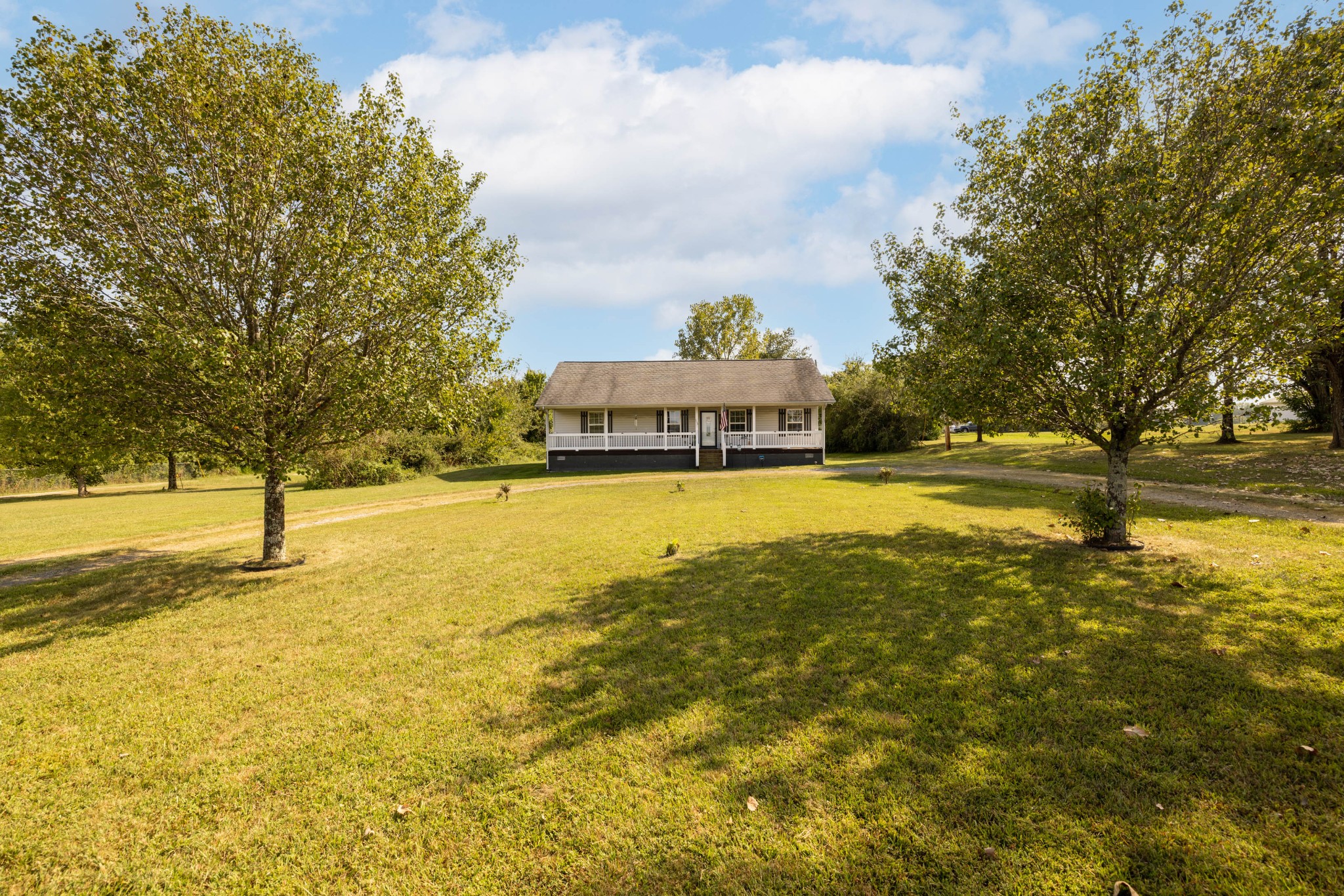 135 Corinth Road Portland, TN 37148 - Photo 38 of 44 a view of a swimming pool with an ocean view