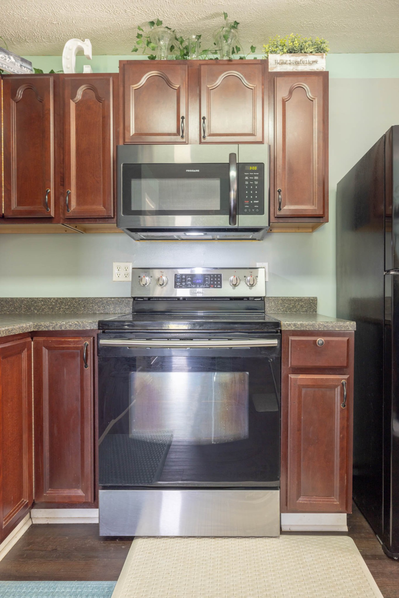 135 Corinth Road Portland, TN 37148 - Photo 10 of 44 a stove top oven sitting inside of a kitchen