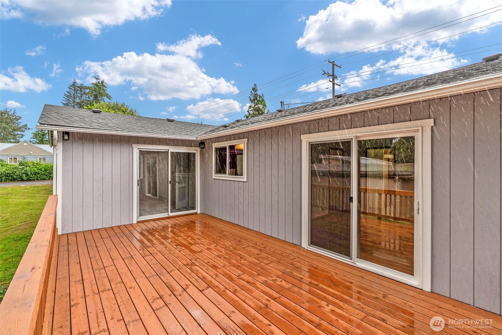 175 Jacobson Road Cathlamet, WA 98612 - Photo 4 of 32 a view of backyard with wooden floor and fence