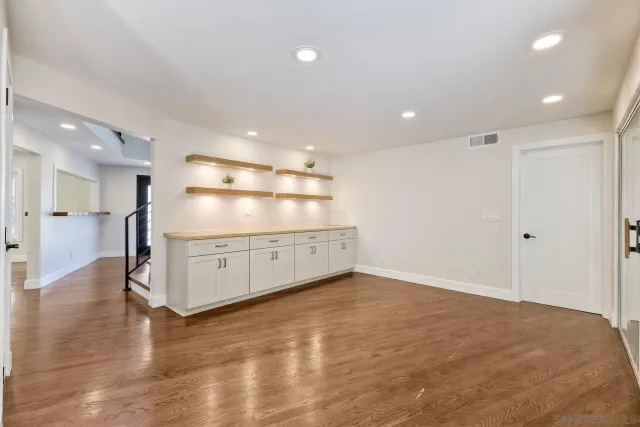 a view of yard with swimming pool and sitting area