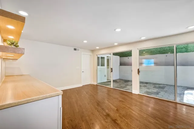 a view of a swimming pool with a patio