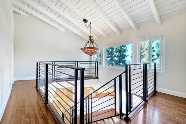 a spacious bathroom with a double vanity sink mirror and toilet