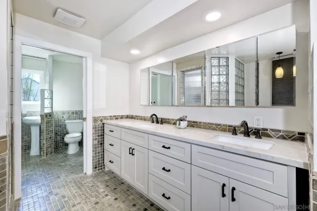 a room with a bed and a chair