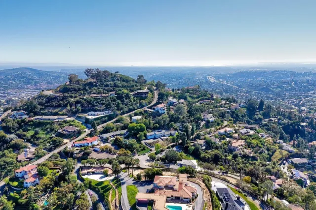 a view of a yard and front view of a house