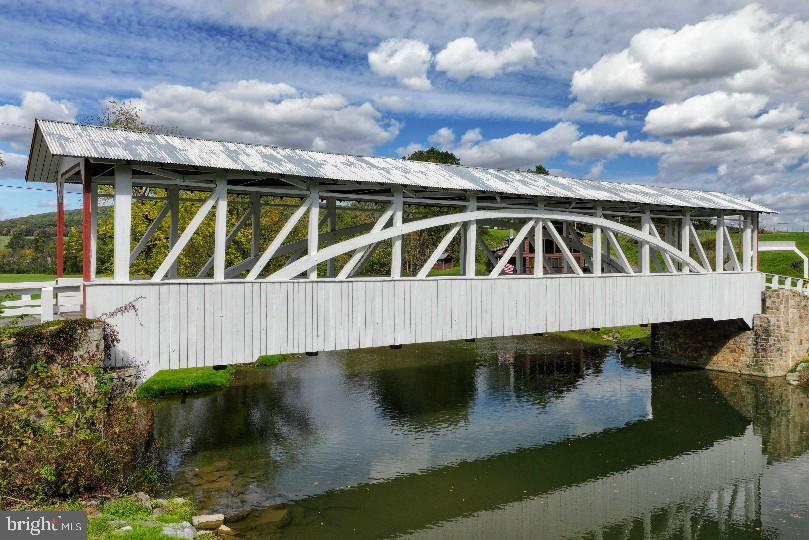 Lot 6 Polecat Hollow Road Hopewell, PA 16650 - Photo 23 of 28 a view of balcony with swimming pool fire pit and outdoor seating
