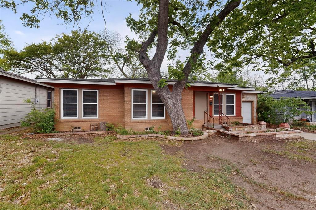 4508 Rutland Avenue Fort Worth, TX 76133 - Photo 4 of 36 front view of a house with a patio