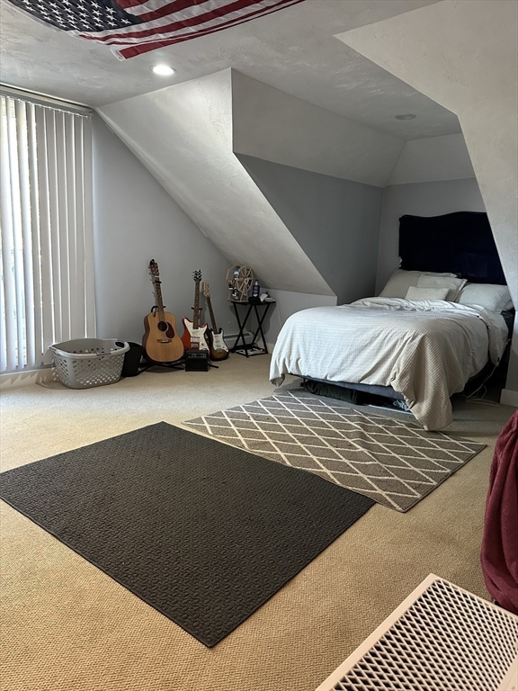 369 Chestnut Street Clinton, MA 01510 - Photo 13 of 21 a bedroom with a bed and a night stand