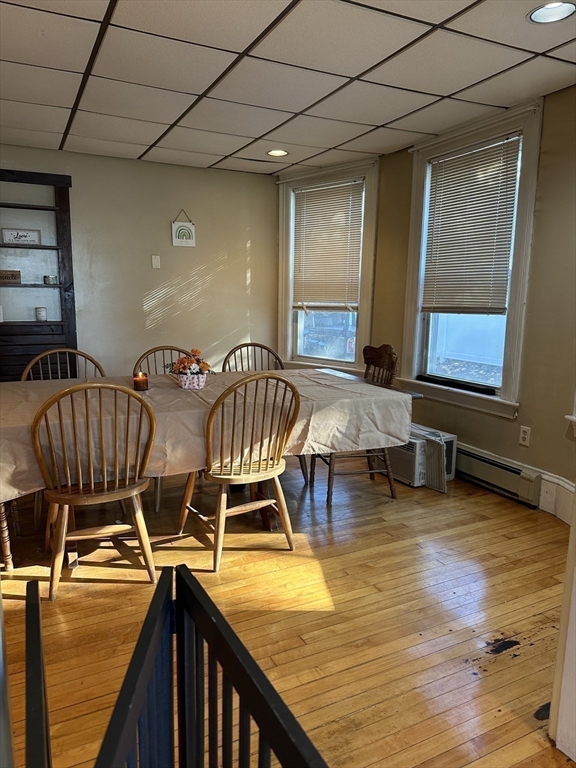 369 Chestnut Street Clinton, MA 01510 - Photo 18 of 21 a view of a dining room with furniture and a chandelier