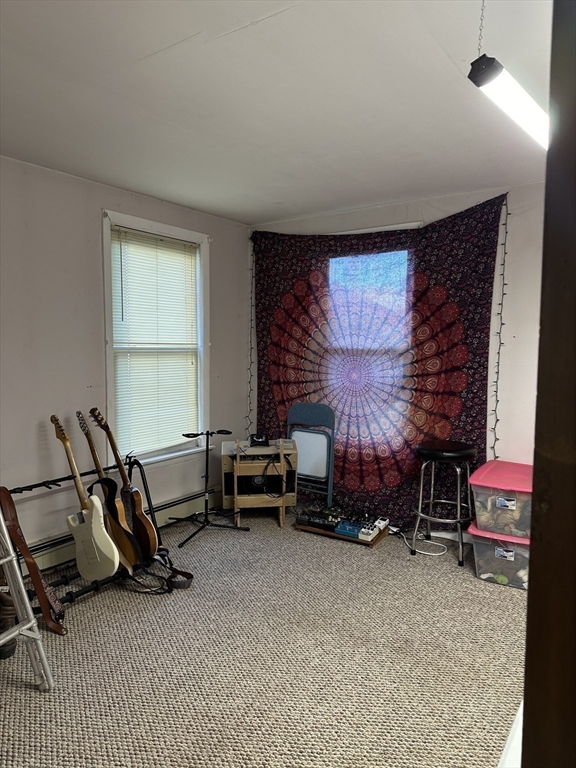 369 Chestnut Street Clinton, MA 01510 - Photo 19 of 21 a room with furniture and windows