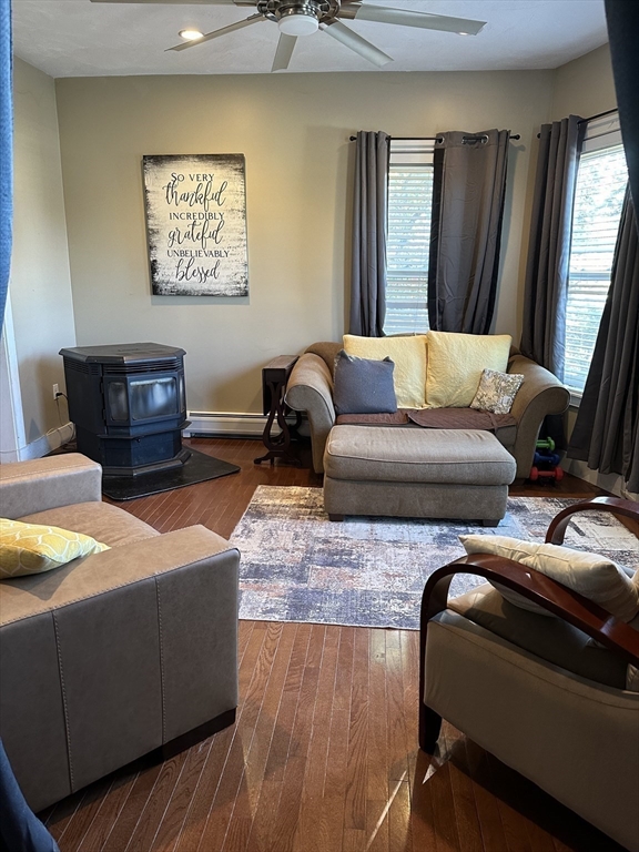 369 Chestnut Street Clinton, MA 01510 - Photo 6 of 21 a living room with furniture and a flat screen tv