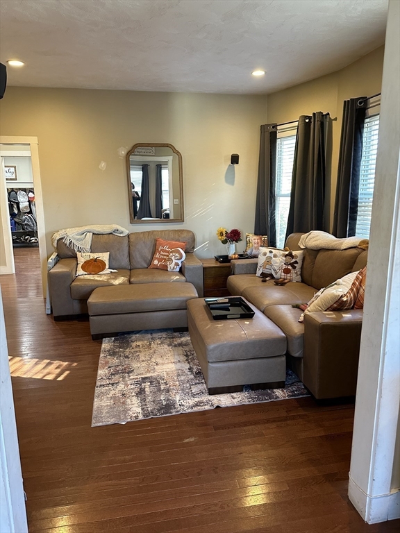 369 Chestnut Street Clinton, MA 01510 - Photo 7 of 21 a living room with furniture and a wooden floor