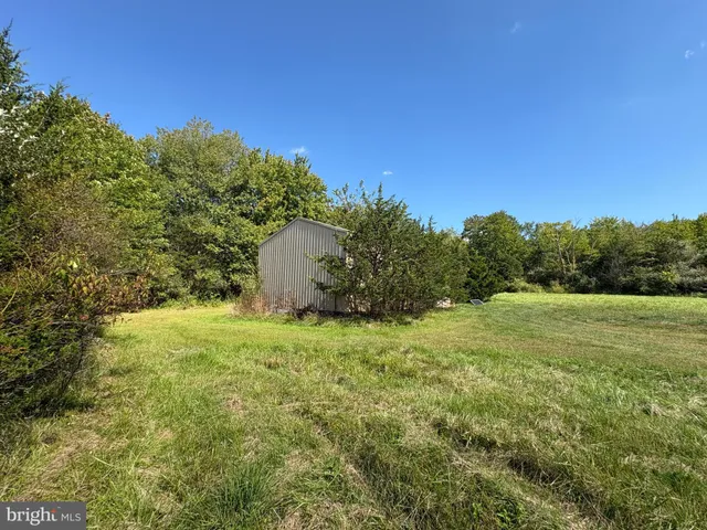 a big yard with lots of green space