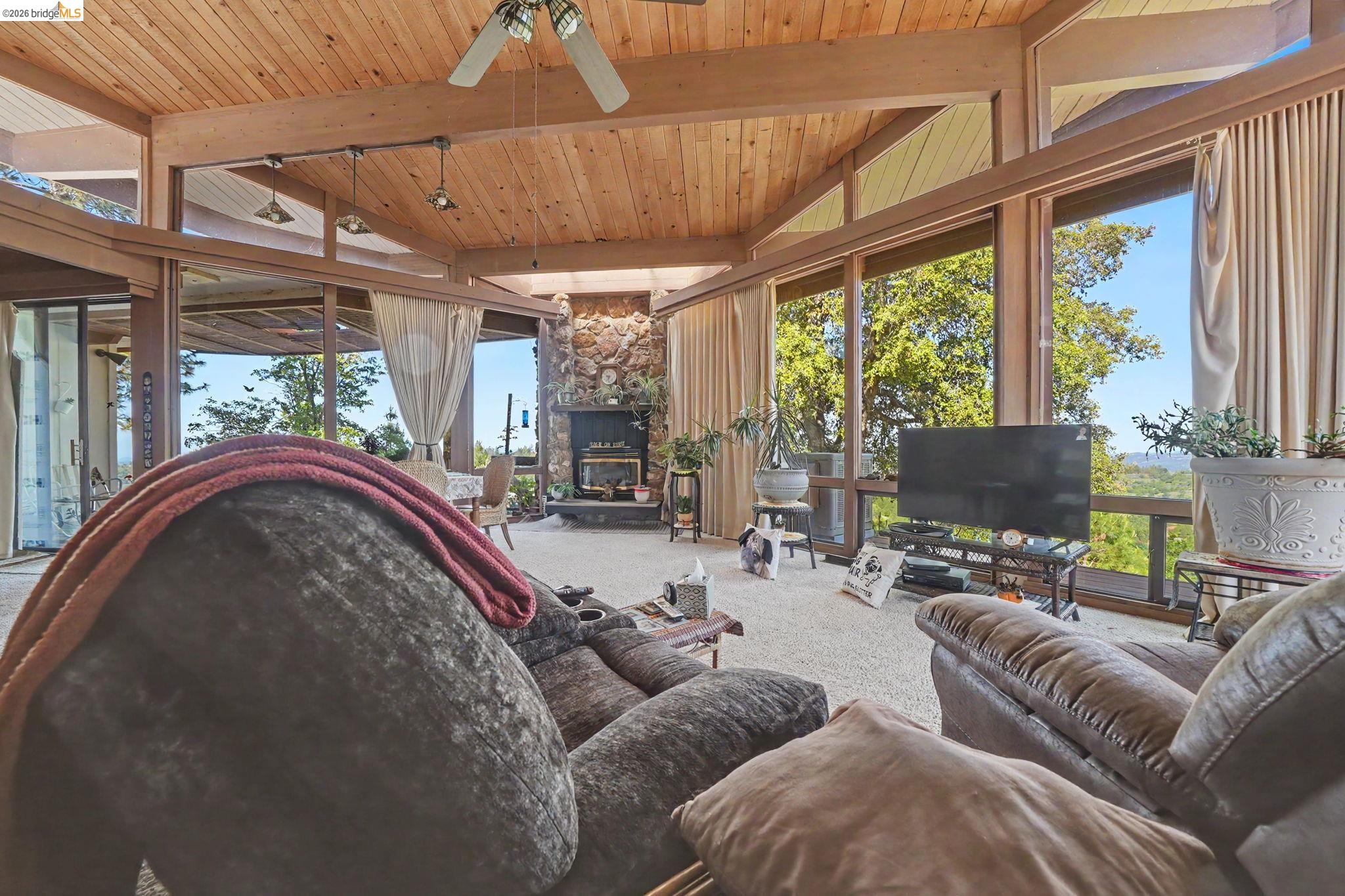 6161 Fullen Road Murphys, CA 95247 - Photo 26 of 53 a living room with furniture and a flat screen tv