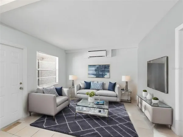 a living room with furniture and a couch