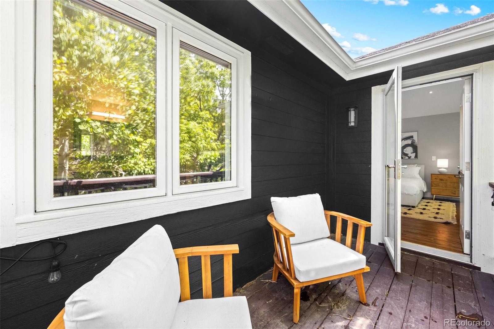 4141 South Hampton Circle Boulder, CO 80301 - Photo 17 of 35 a view of a living room and a window with wooden floor