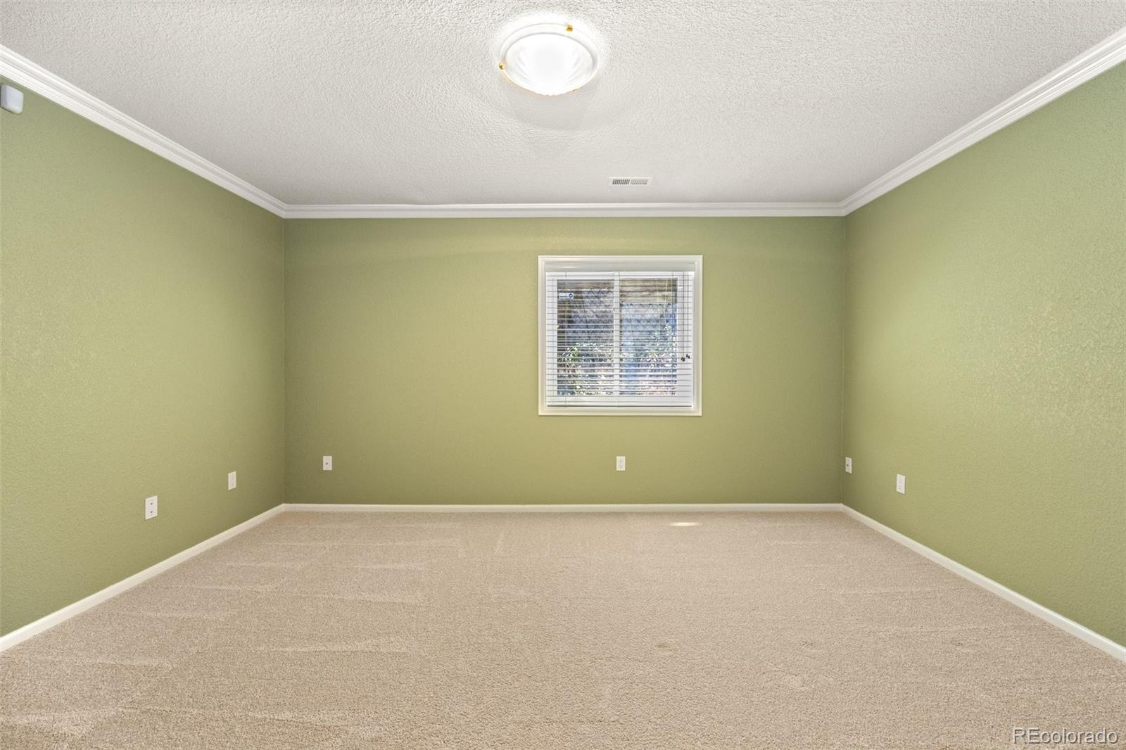 4141 South Hampton Circle Boulder, CO 80301 - Photo 24 of 35 an empty room with a empty space and a window