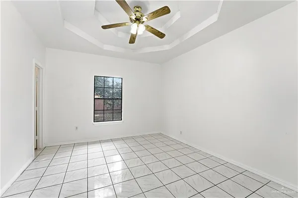a view of an empty room and window