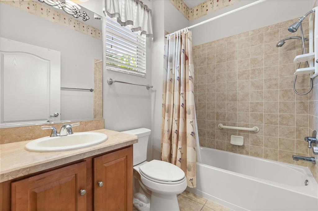 1424 Irwin Way The Villages, FL 32162 - Photo 16 of 28 a bathroom with a sink toilet and shower