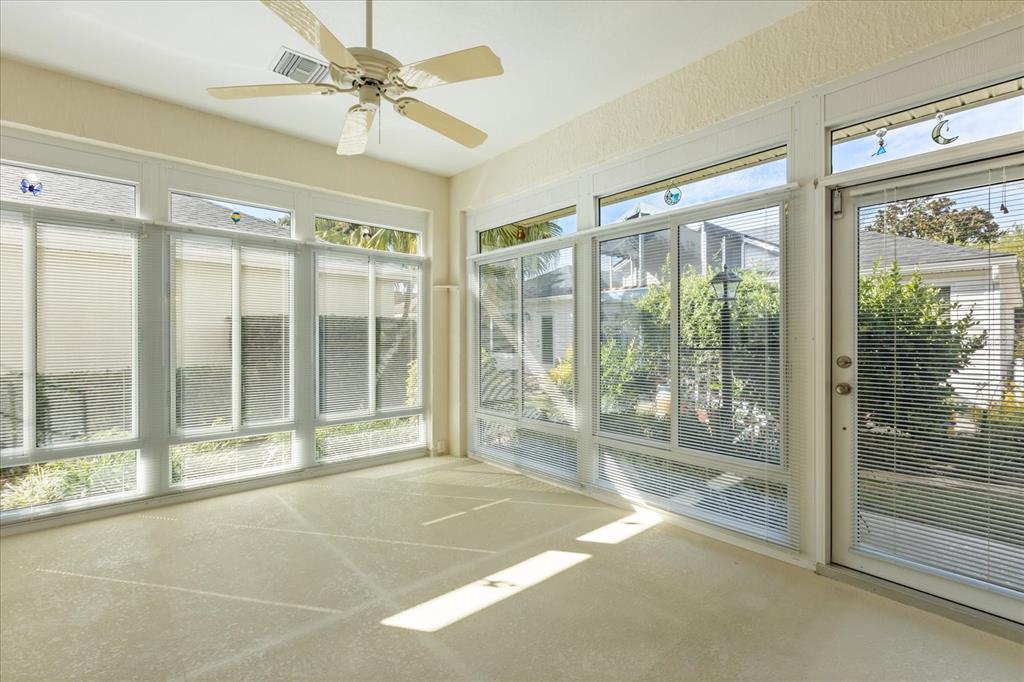 1424 Irwin Way The Villages, FL 32162 - Photo 23 of 28 a view of an empty room with a balcony