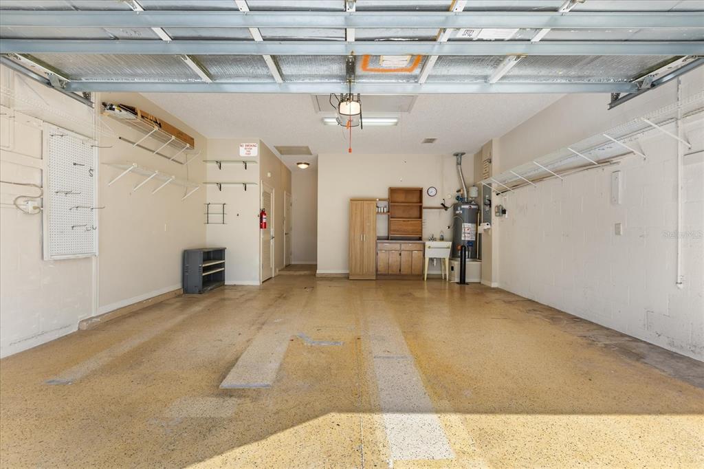 1424 Irwin Way The Villages, FL 32162 - Photo 25 of 28 a view of a garage with furniture