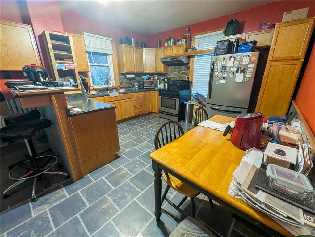 29 Main Street Freeport, PA 16229 - Photo 14 of 34 a room with gym equipment and wooden floor