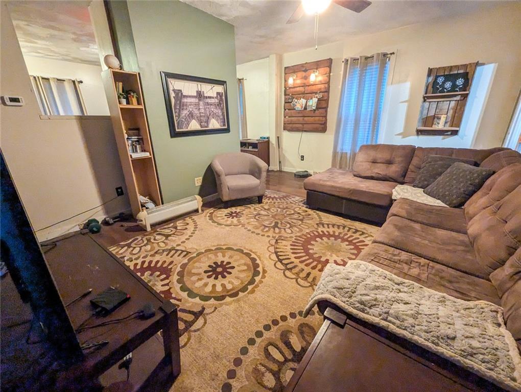 29 Main Street Freeport, PA 16229 - Photo 23 of 34 a living room with furniture and a window