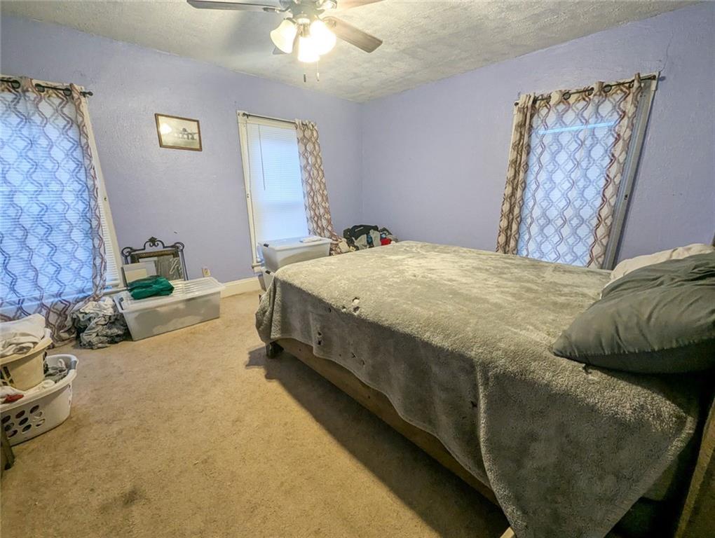 29 Main Street Freeport, PA 16229 - Photo 28 of 34 a bedroom with a bed and a couch