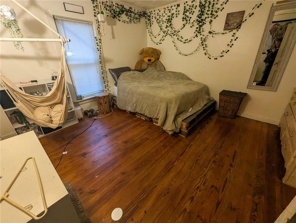 29 Main Street Freeport, PA 16229 - Photo 33 of 34 a bedroom with a bed and wooden floor