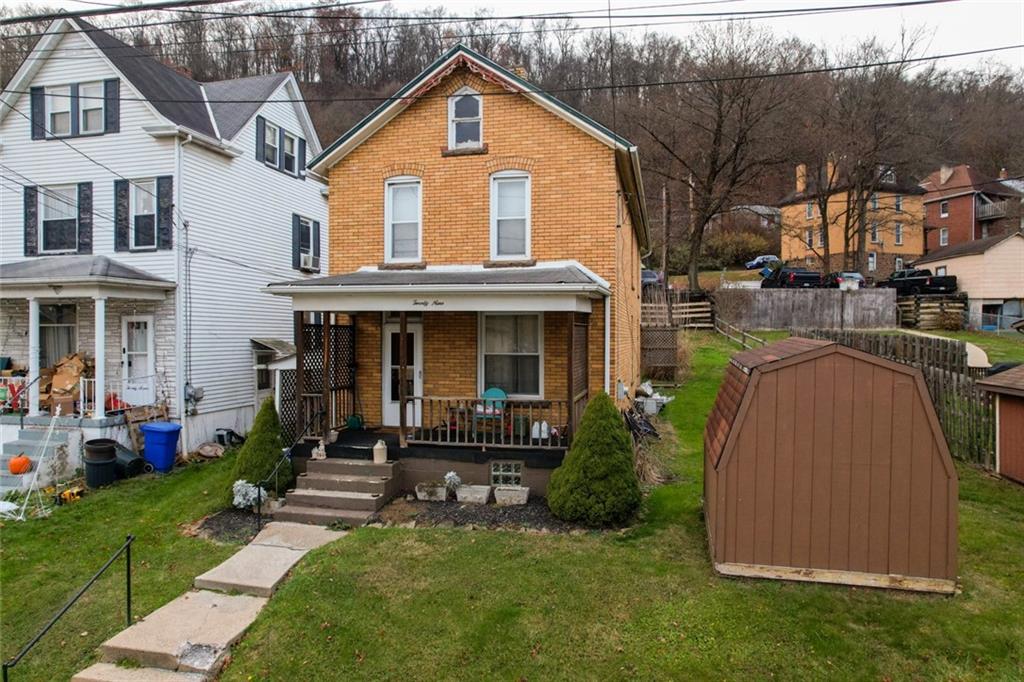 29 Main Street Freeport, PA 16229 - Photo 4 of 34 a view of a house with a yard patio and a fire pit
