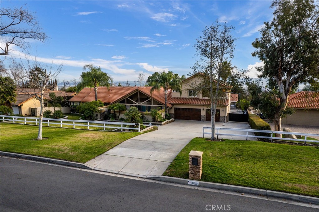 10819 Hillside Road Rancho Cucamonga, CA 91737 - Photo 1 of 1 a view of a swimming pool with a garden