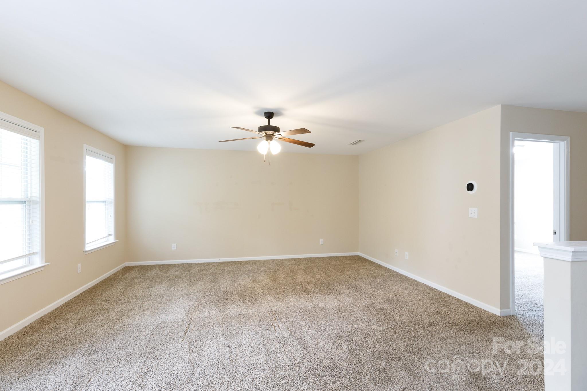 2219 Bluebell Way Fort Mill, SC 29708 - Photo 19 of 48 a view of an empty room with a window
