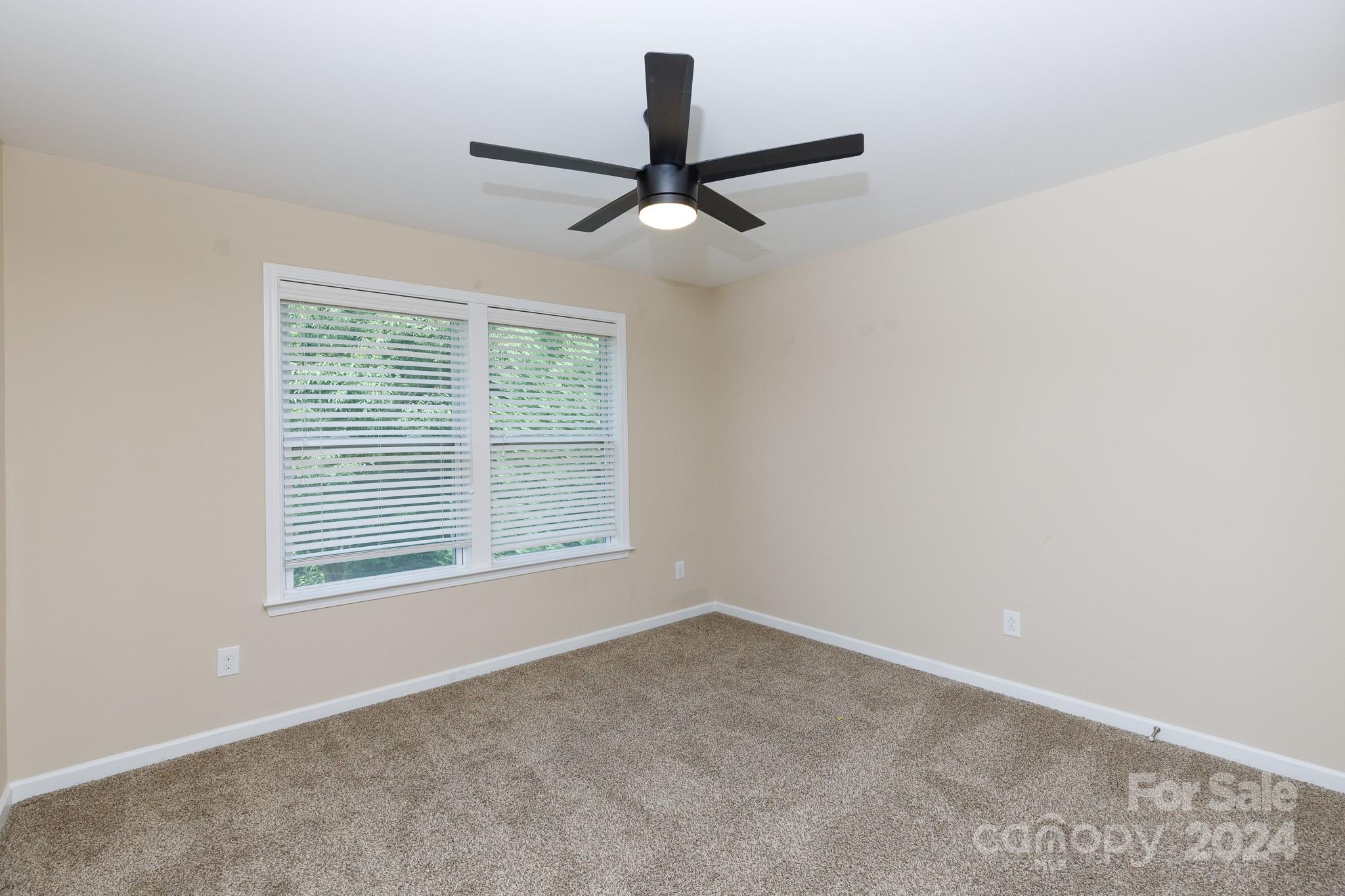 2219 Bluebell Way Fort Mill, SC 29708 - Photo 29 of 48 a view of an empty room with a window