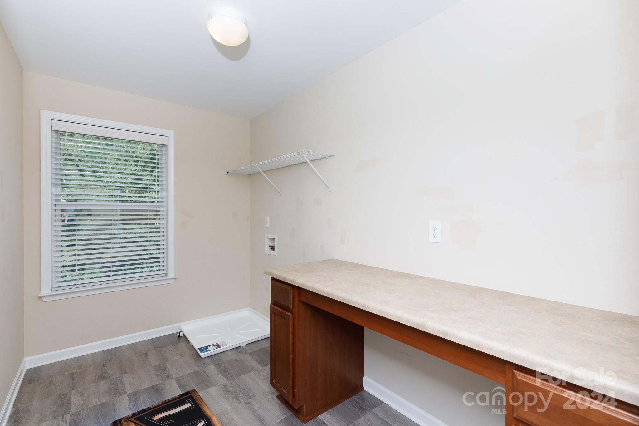 2219 Bluebell Way Fort Mill, SC 29708 - Photo 31 of 48 a room with window and a ceiling fan