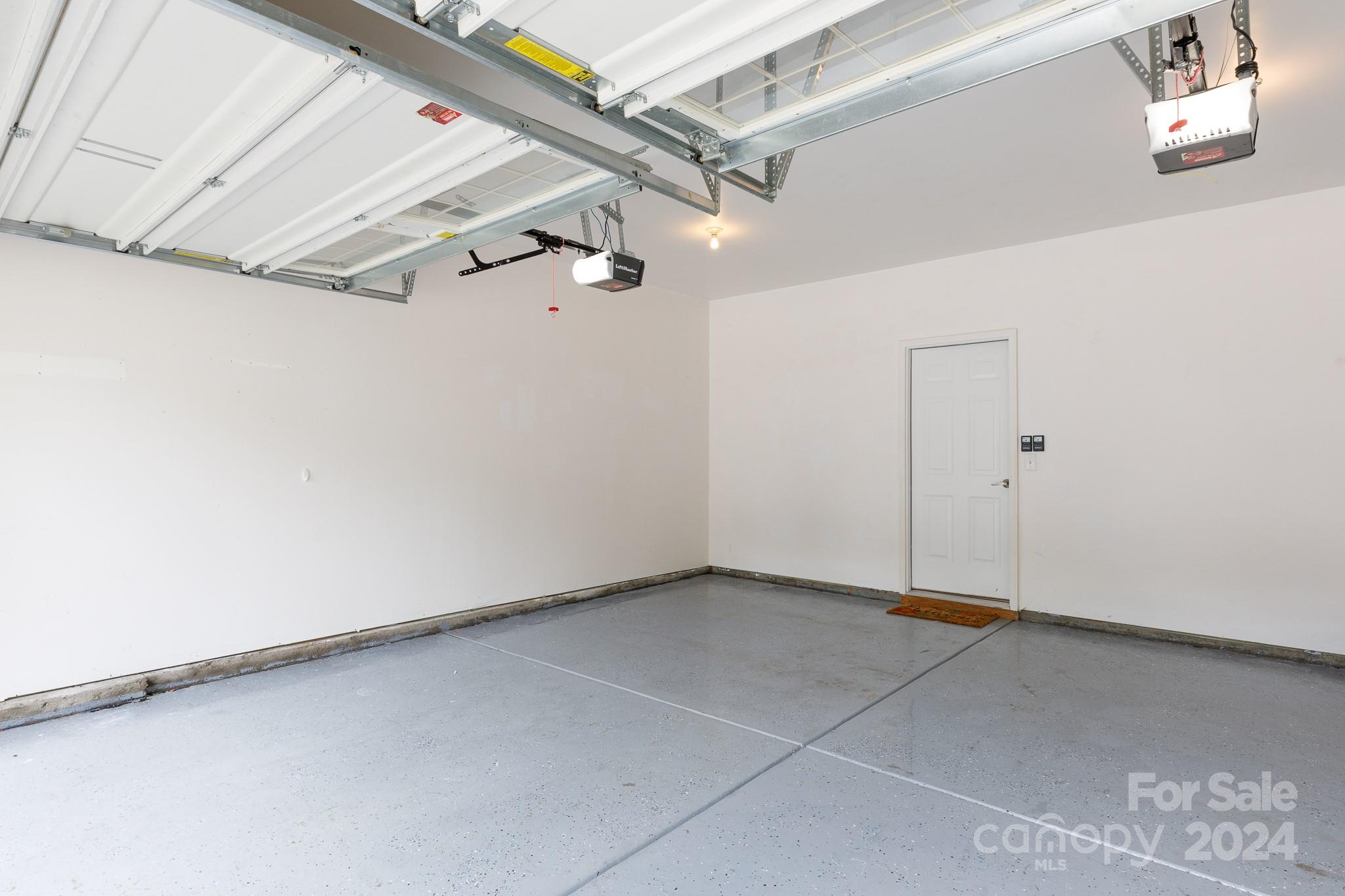 2219 Bluebell Way Fort Mill, SC 29708 - Photo 34 of 48 a view of a room with racks on the wall