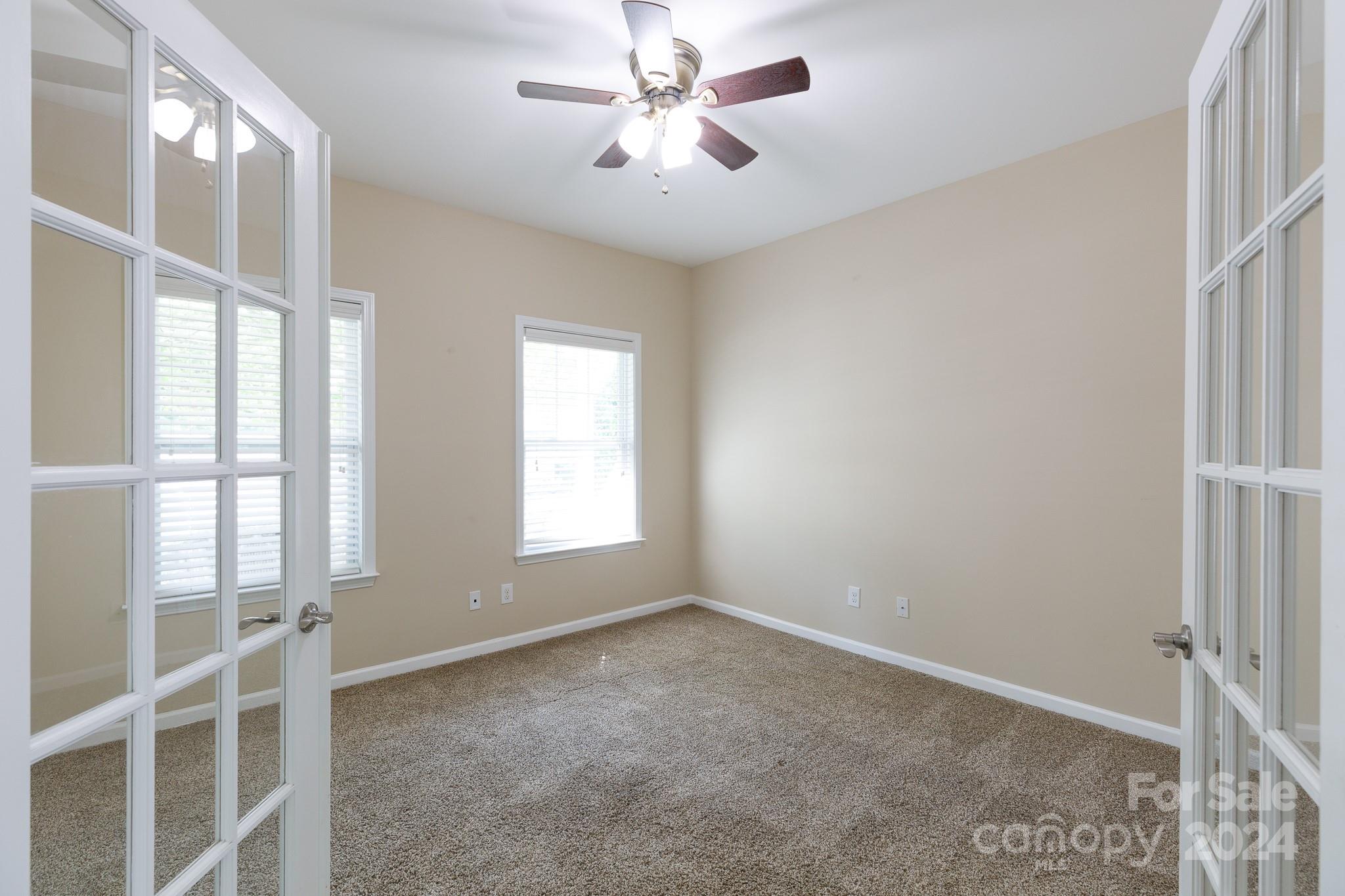 2219 Bluebell Way Fort Mill, SC 29708 - Photo 5 of 48 a view of an empty room with a window