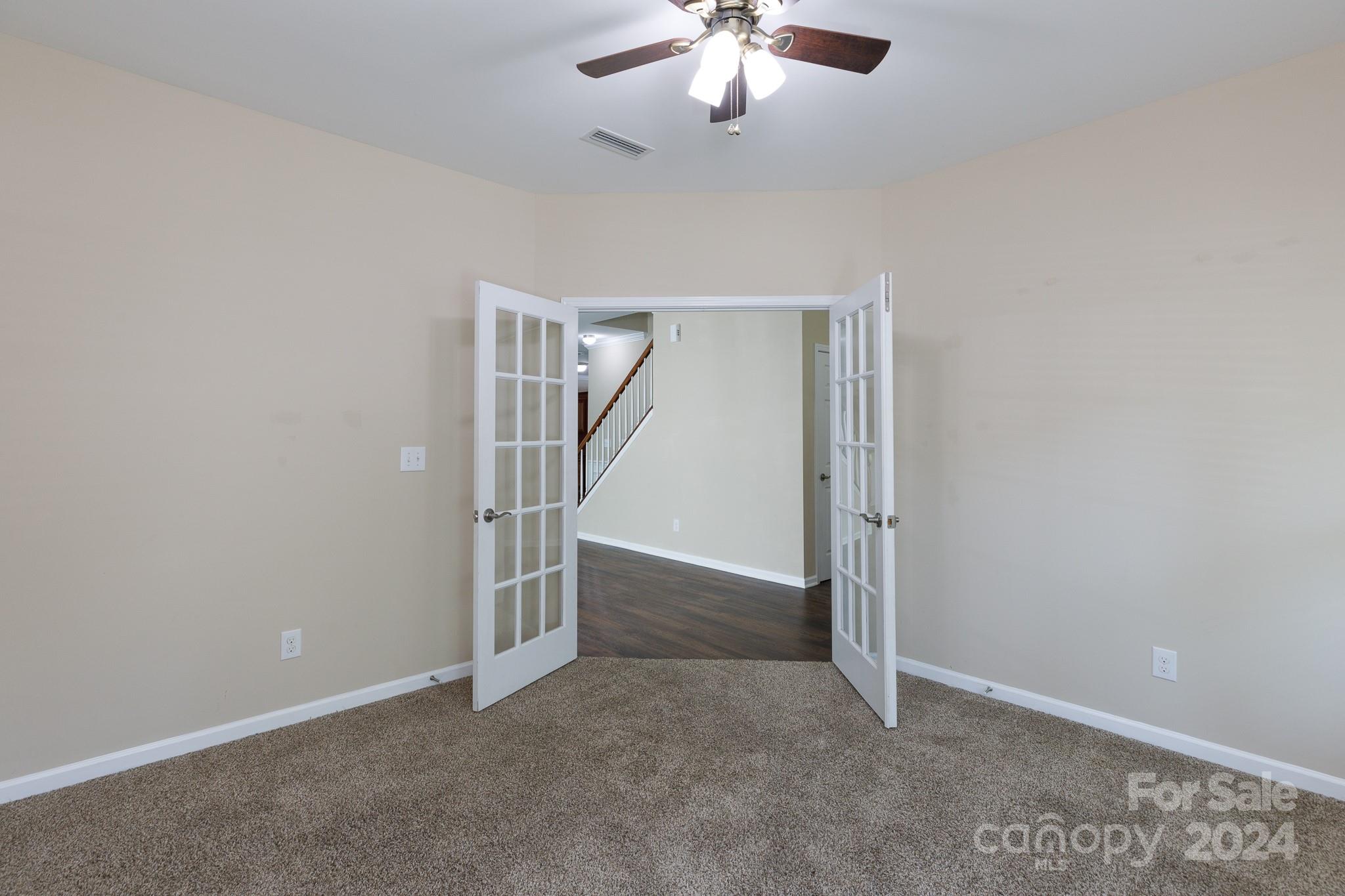 2219 Bluebell Way Fort Mill, SC 29708 - Photo 6 of 48 an empty room with a empty space and chandelier fan