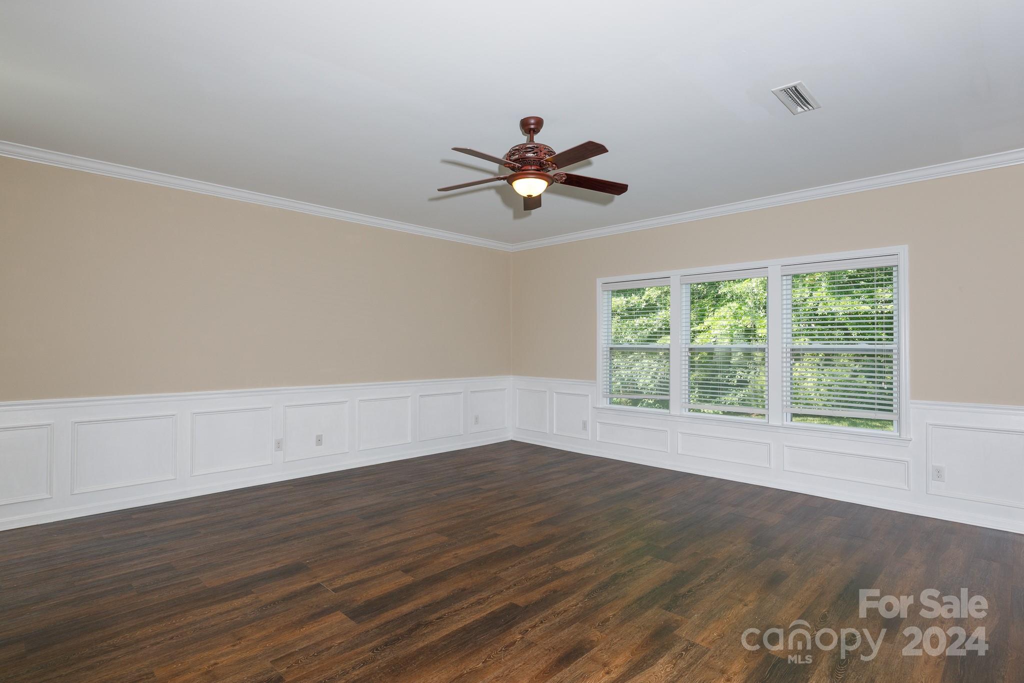 2219 Bluebell Way Fort Mill, SC 29708 - Photo 8 of 48 wooden floor in an empty room with a window