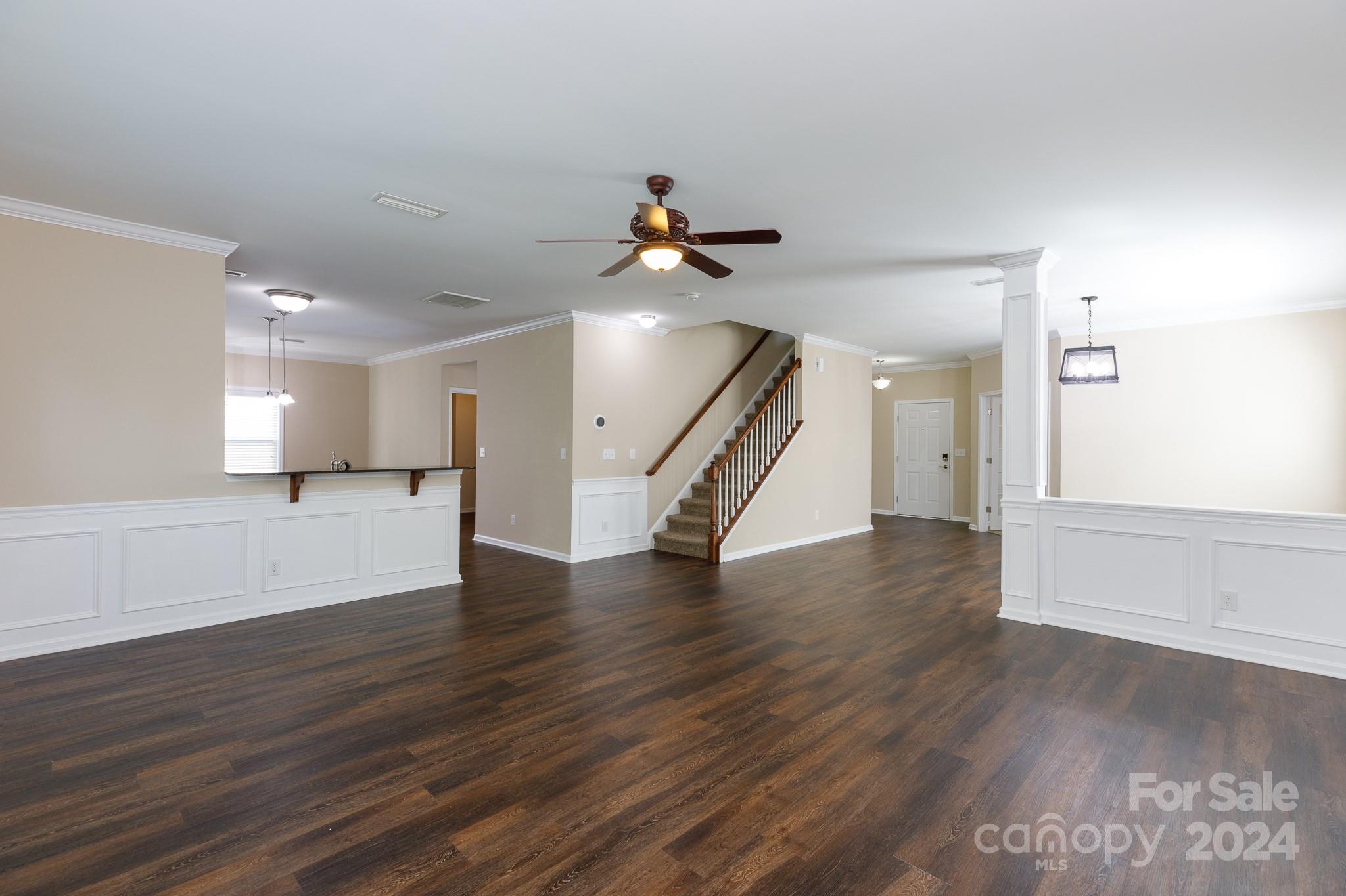 2219 Bluebell Way Fort Mill, SC 29708 - Photo 9 of 48 a view of an empty room and wooden floor