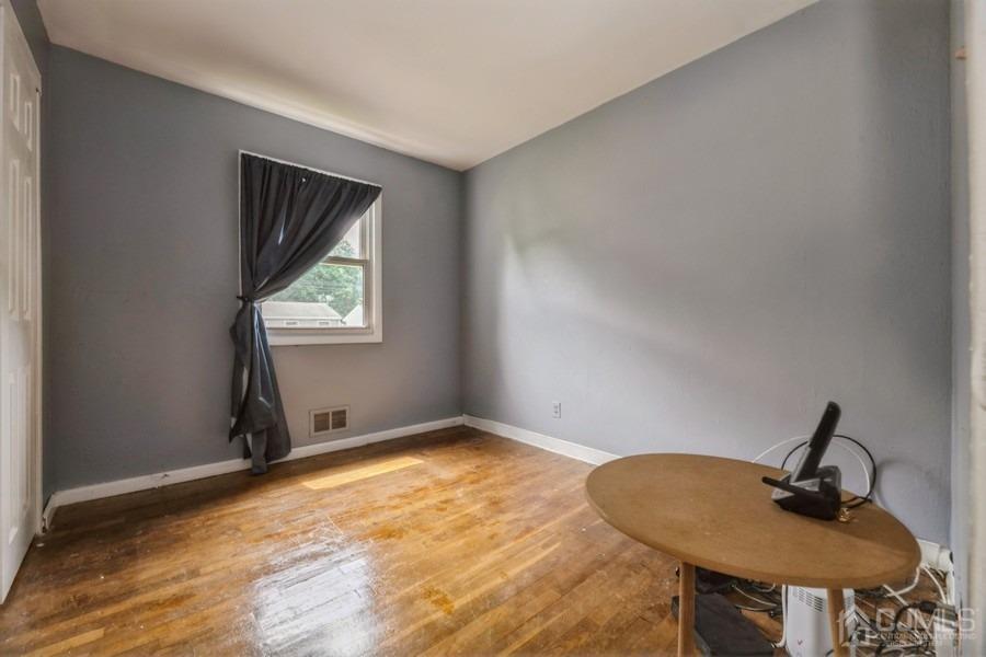 197 Princeton Road Old Bridge, NJ 08859 - Photo 15 of 25 a view of a room with a window and furniture