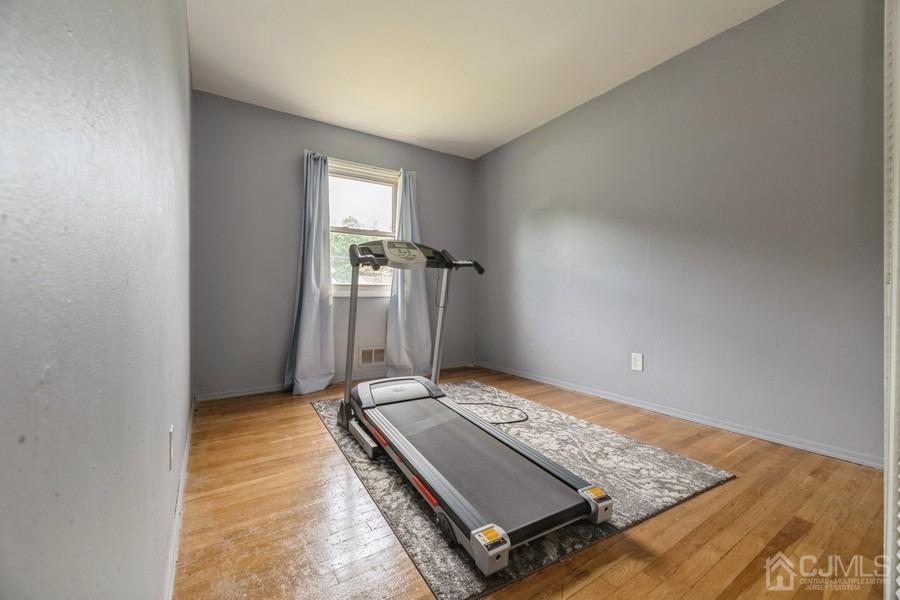 197 Princeton Road Old Bridge, NJ 08859 - Photo 16 of 25 a living room with a rug
