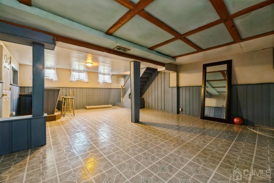 197 Princeton Road Old Bridge, NJ 08859 - Photo 18 of 25 a view of an empty room with wooden floor